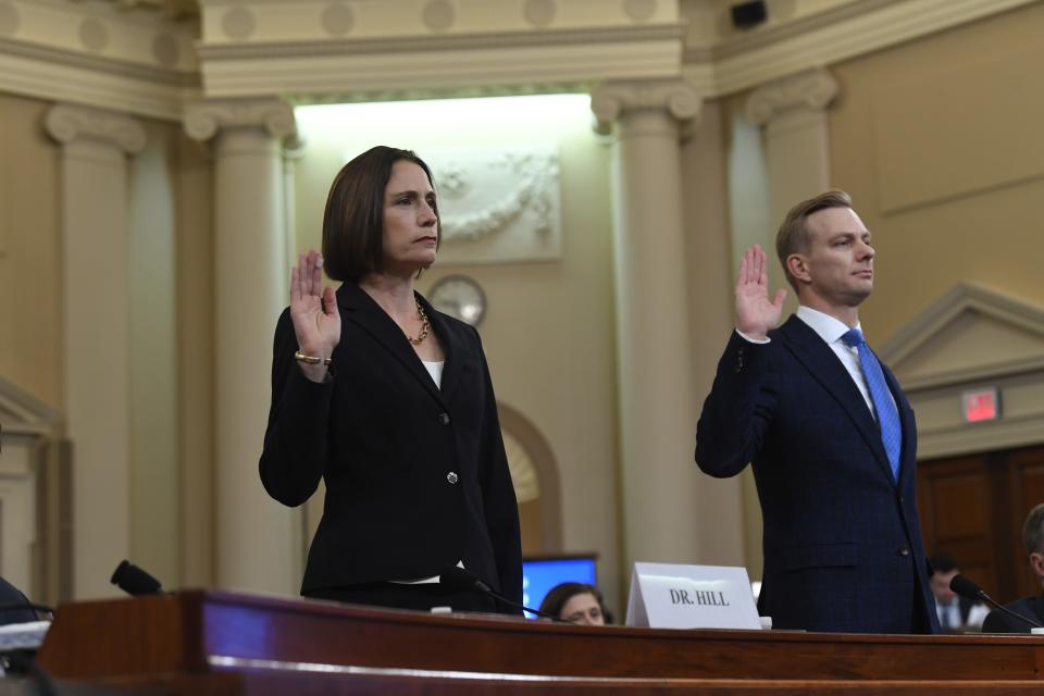 National Security Council official Fiona Hill and State department official David Holmes are sworn in before they testify before the Permanent Select Committee on Intelligence on Nov. 21, 2019.