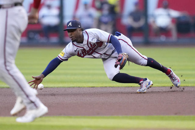 April 06, 2023: Atlanta Braves infielder Orlando Arcia walks back