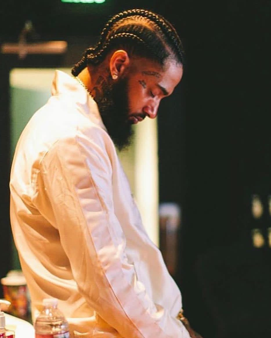 <p>Nipsey Hussle‘s death has shaken the hip-hop community to its core and tributes are continuing to pour in from star’s closest friends. It’s been nearly three days since his senseless slaying and prominent A-listers are still reeling his untimely death. Stars like Ashanti, T.I., Ice Cube and Future took time to gather their thoughts before sharing […]</p> <p>The post <a rel="nofollow noopener" href="https://theblast.com/nipsey-hussle-celebrity-reactions-tributes/" target="_blank" data-ylk="slk:Nipsey Hussle Tributes Continue to Pour in from Celebrity Friends Following Death;elm:context_link;itc:0;sec:content-canvas" class="link ">Nipsey Hussle Tributes Continue to Pour in from Celebrity Friends Following Death</a> appeared first on <a rel="nofollow noopener" href="https://theblast.com" target="_blank" data-ylk="slk:The Blast;elm:context_link;itc:0;sec:content-canvas" class="link ">The Blast</a>.</p>