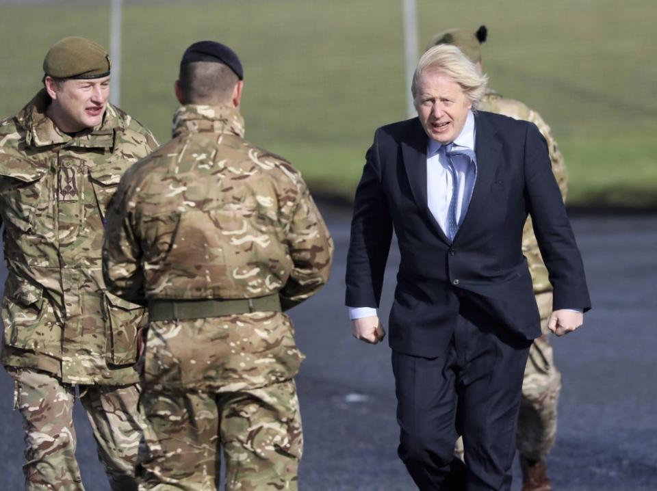 Boris Johnson has drawn back from activating plans to deploy troops (Peter Morrison/PA) (PA Archive)