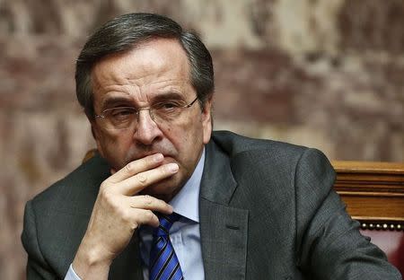 Greece's Prime Minister Antonis Samaras reacts during the second of three rounds of a presidential vote at the Greek parliament in Athens December 23, 2014. REUTERS/Alkis Konstantinidis