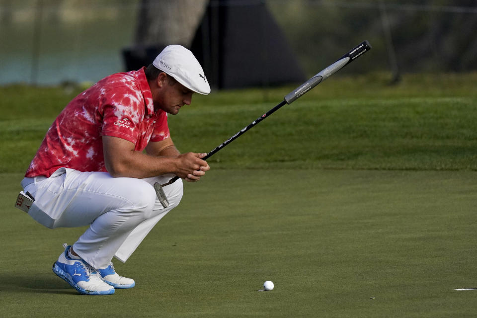 Bryson DeChambeau lines up a putt on the 10th hole during the second round of the PGA Championship golf tournament at TPC Harding Park Friday, Aug. 7, 2020, in San Francisco. (AP Photo/Jeff Chiu)