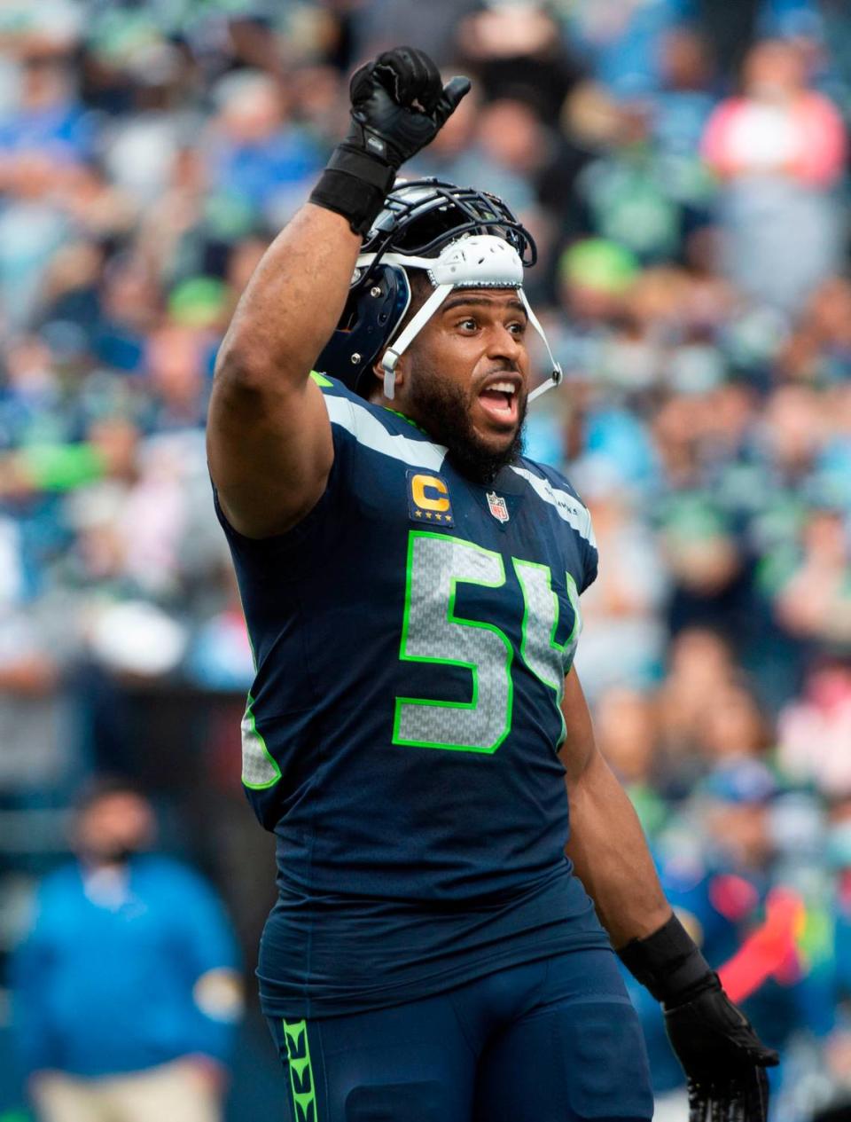 Bobby Wagner hollers at the fans after a touchdown pass to Julio Jones was overturned for stepping out of bounds. The Seattle Seahawks played the Tennessee Titans in an NFL football game at Lumen Field in Seattle, Wash., on Sunday, Sept. 19, 2021.