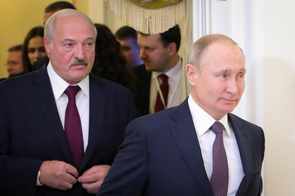 Russian President Vladimir Putin (R) followed by Belarusian President Alexander Lukashenko (L), enters a meeting hall during the Supreme Eurasian Economic Council, in Saint Petersburg on December 20, 2019. / Credit: MIKHAIL KLIMENTYEV/Sputnik/AFP/Getty