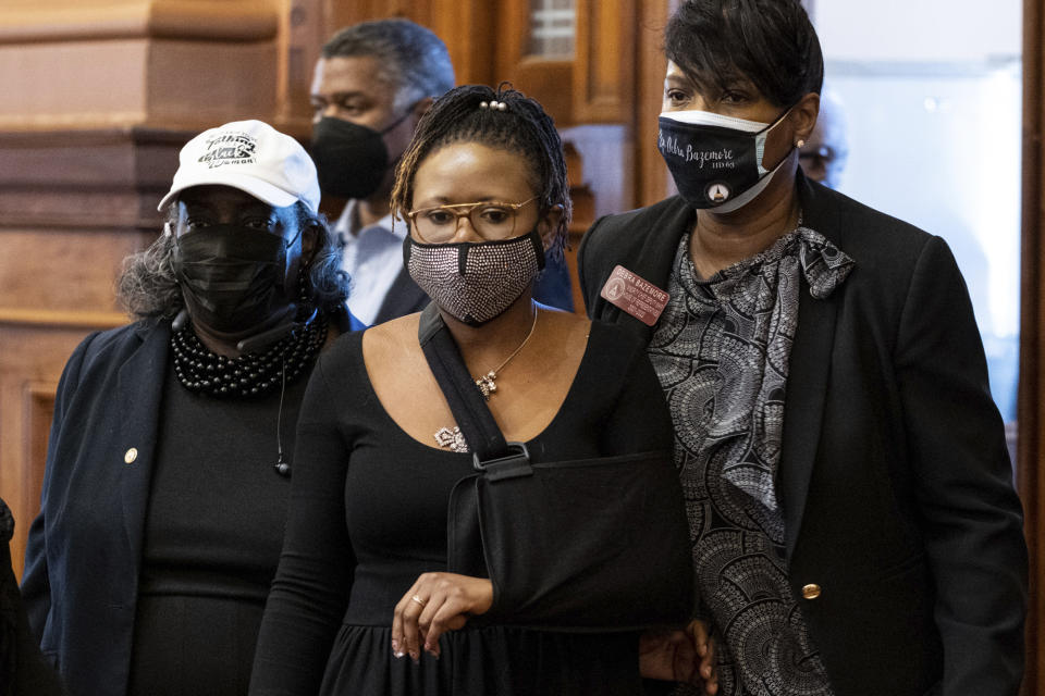 Georgia State Rep. Park Cannon, D-Atlanta, walks into the House Chamber of the State Capitol in Atlanta on Monday morning, March 29, 2021 after being arrested last week for knocking on the governor's office door as he signed voting legislation. (AP Photo/Ben Gray)