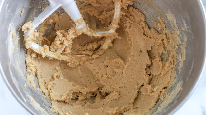 butter and sugars beaten together in a bowl