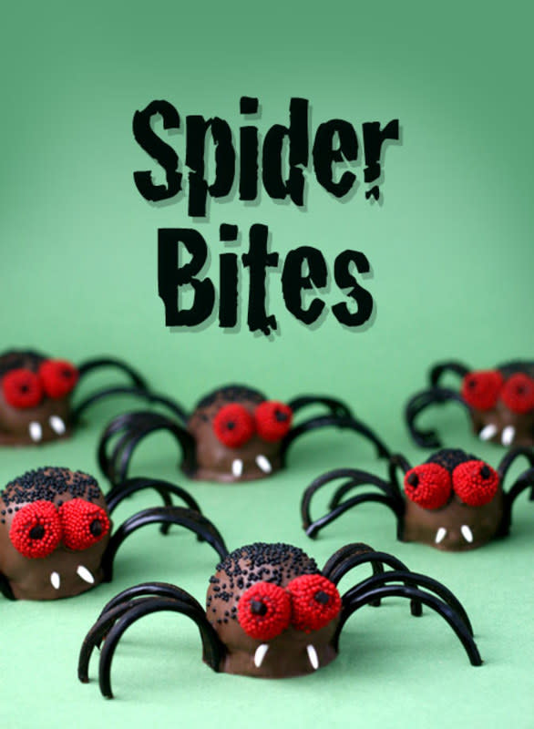 <p>Have no fear, these chocolate spider confections don't actually bite. Their legs are licorice. And they’re really easy to assemble.</p><p><strong>Get the recipe: </strong><a href="https://www.bakerella.com/spiders-spiders-spiders/" rel="nofollow noopener" target="_blank" data-ylk="slk:Spider Bites;elm:context_link;itc:0;sec:content-canvas" class="link ">Spider Bites</a></p>