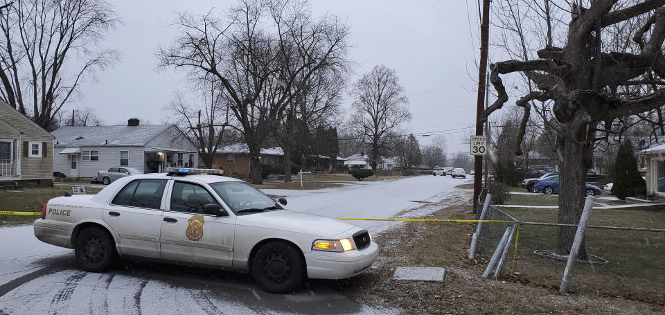 Indianapolis Metropolitan Police Department work the scene Sunday, Jan. 24, 2021 in Indianapolis where five people, including a pregnant woman, were shot to death early Sunday inside an Indianapolis home. The pregnant woman who was taken to an area hospital, both she and the unborn child died despite life-saving efforts. (Justin L. Mack/The Indianapolis Star via AP)