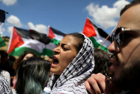 Members of Israel's Arab minority take part in a rally marking the "Nakba" or "Catastrophe", when Palestinians lament the loss of their homeland in the 1948-49 war, that caused the creation of Israel, near the abandoned village of Khubbayza, northern Israel May 9, 2019. REUTERS/Ammar Awad