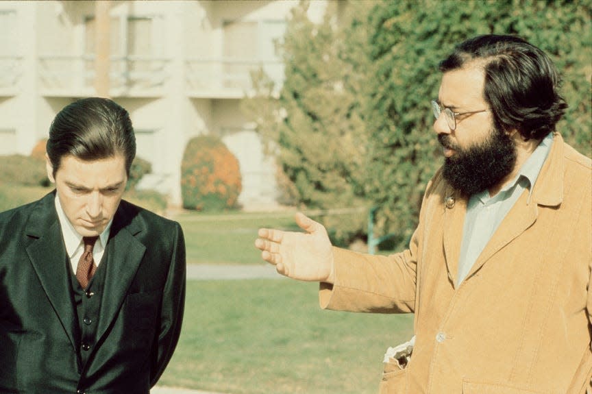 Al Pacino as Michael Corleone speaks with Francis Ford Coppola on the set of "The Godfather."