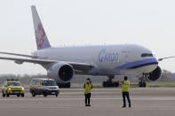 In this photo released by the Taiwan Centers for Disease Control, a China Airlines cargo plane carrying COVID-19 vaccines from Memphis arrive at the airport outside Taipei, Taiwan, Sunday, June 20, 2021. The U.S. sent 2.5 million doses of the Moderna COVID-19 vaccine to Taiwan on Sunday, tripling an earlier pledge in a donation with both public health and geopolitical meaning. (Taiwan Centers for Disease Control via AP)