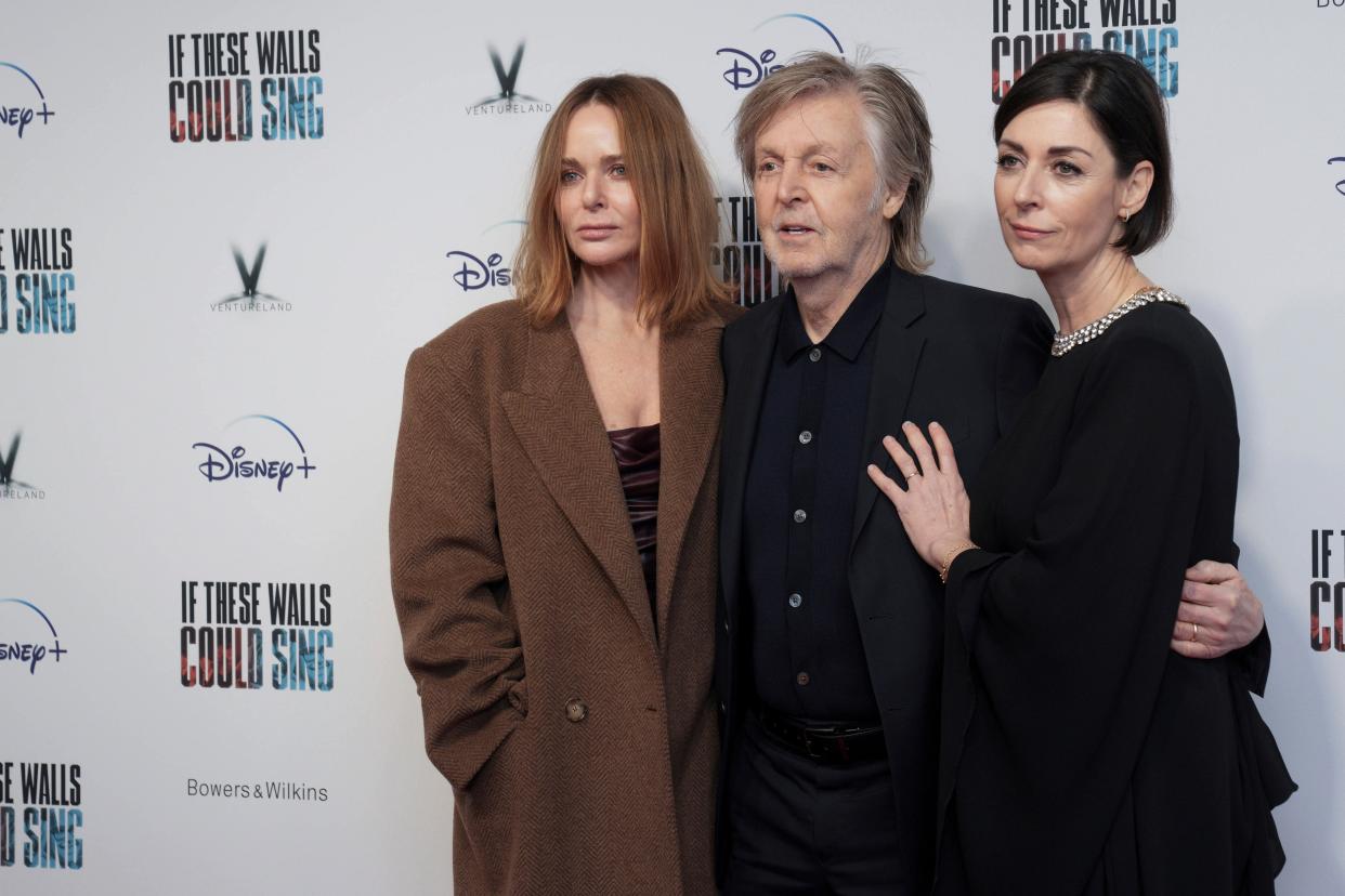 Stella McCartney (from left), Paul McCartney and Mary McCartney pose for photographers at the Dec. 12 London premiere of 