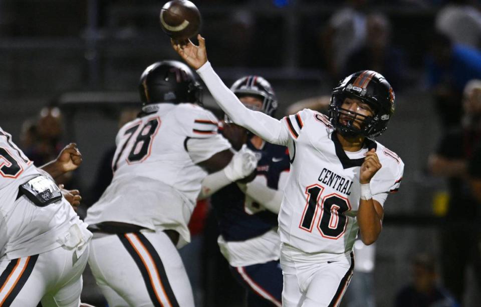 Central High quarterback Jelani Dippel passes against Garza High in the opening game of the 2024 season at Koligian Stadium Friday, Aug. 23, 2024 in Fresno.