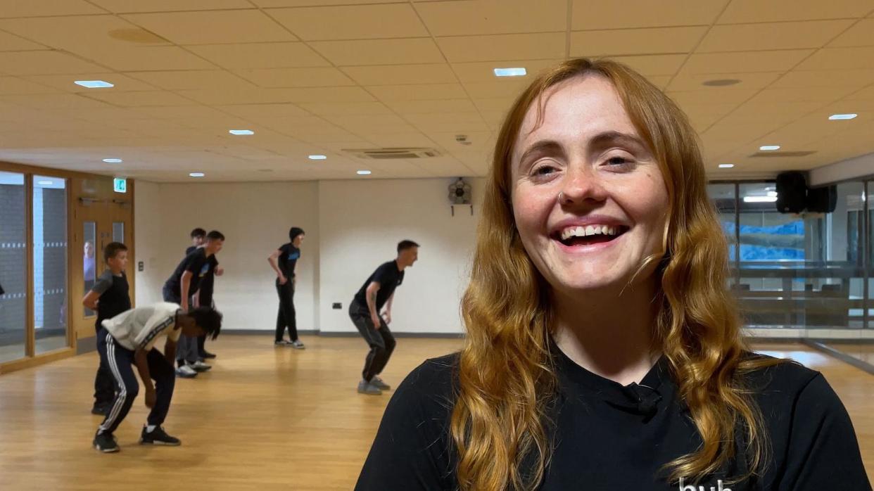 Emma Bouch standing in a dance studio