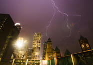 <p>Lightning over downtown Minneapolis during a thunderstorm in Minneapolis on Wednesday, Sept. 21, 2016. (Leila Navidi/Star Tribune via AP)</p>