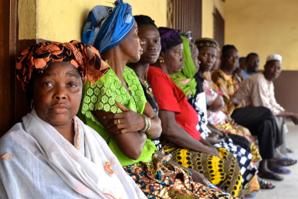 Ebola survivors in Freetown, Sierra Leone, wait to see a doctor about lingering symptoms.