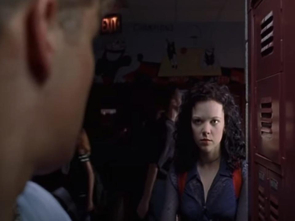 carrie 2 scene with girl staring at someone with locker in the foreground