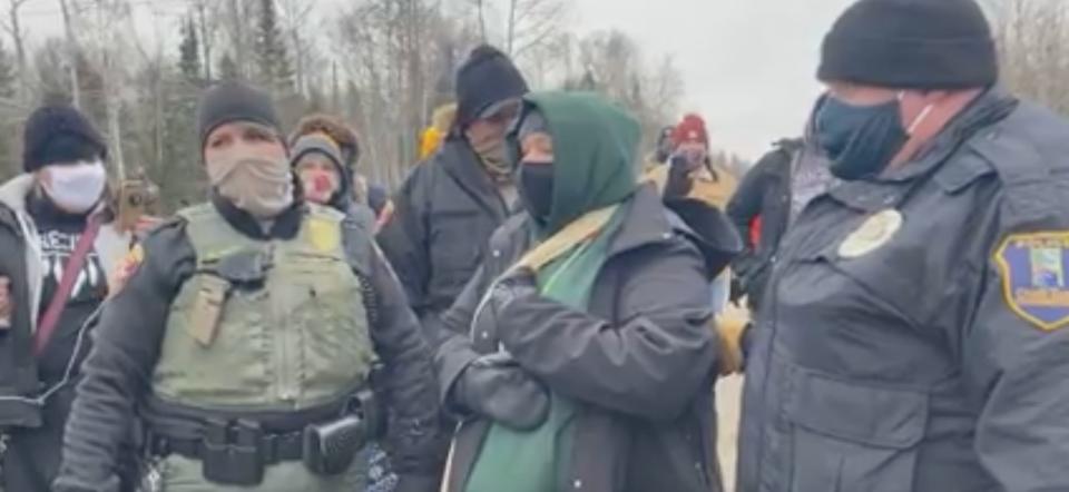 Dawn Goodwin, pictured in the green hoodie in the center, was cited on Dec. 12, 2020, for stepping too close to the Line 3 pipeline construction site during a protest. (Photo: Dawn Goodwin)