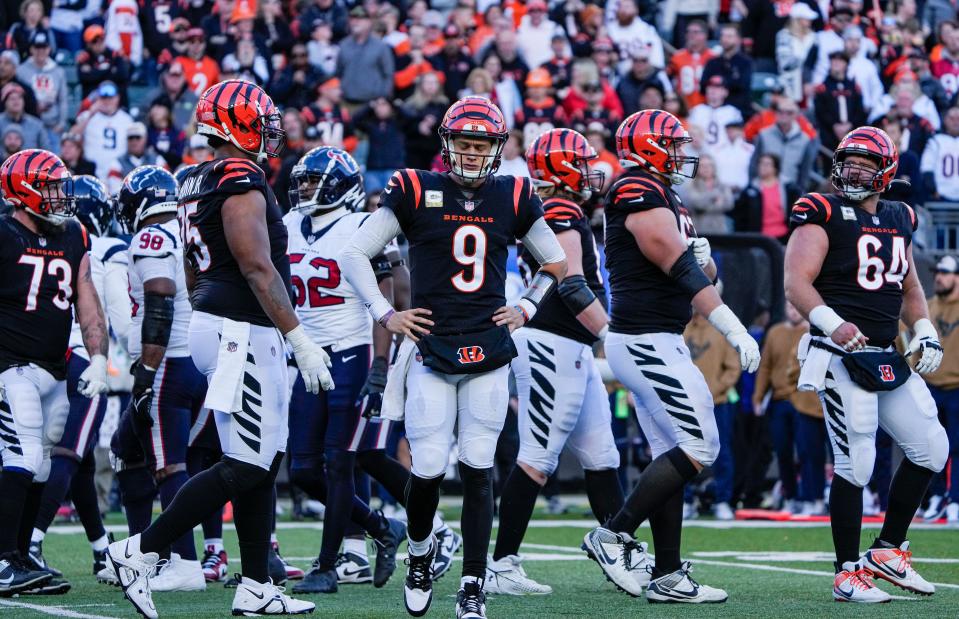 Bengals quarterback Joe Burrow reacts after being sacked in the fourth quarter, one of the four times the Texans got to him.