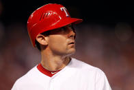 ARLINGTON, TX - OCTOBER 23: Michael Young #10 of the Texas Rangers reacts after flying out to end the fifth inning during Game Four of the MLB World Series against the St. Louis Cardinals at Rangers Ballpark in Arlington on October 23, 2011 in Arlington, Texas. (Photo by Tom Pennington/Getty Images)