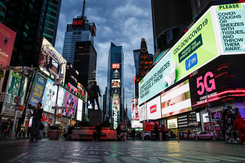 <p>Times Square in New York on March 20, 2020. </p> ((AP Photo/John Minchillo, File))