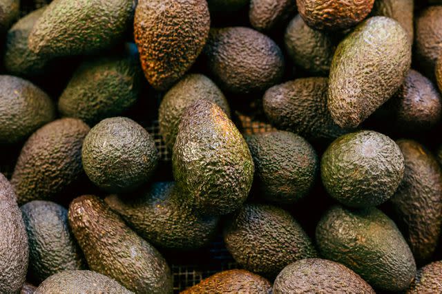 <p>Getty Images</p> Fresh avocados at a market