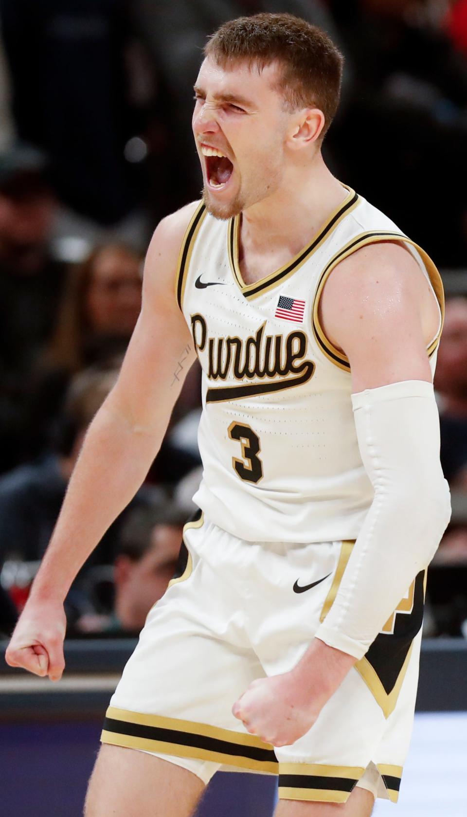 Purdue Boilermakers guard Braden Smith (3) celebrates after scoring during the NCAA men’s basketball game against the Arizona Wildcats, Saturday, Dec. 16, 2023, at Gainbridge Fieldhouse in Indianapolis. Purdue Boilermakers won 92-84.