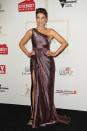 <p>Dannii Minogue brought the glamour to the red carpet in a purple metallic dress by Christahlea with a daring thigh high split.</p>