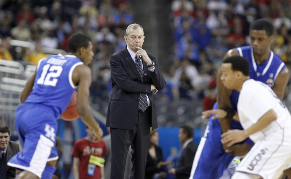 Connecticut Huskies' head coach Jim Calhoun watches his team play the Kentucky Wildcats during their semi-final NCAA Final Four college basketball game in Houston, Texas April 2, 2011. REUTERS/Lucy Nicholson (UNITED STATES - Tags: SPORT BASKETBALL)