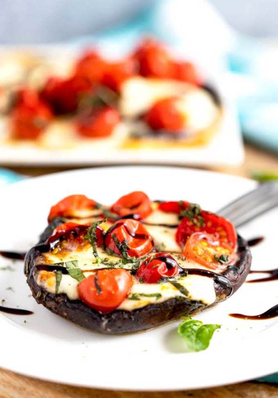 <p>Lemon Blossoms</p><p>Grilled Portobello Mushrooms bathed in a simple balsamic herb marinade, topped with fresh mozzarella cheese, cherry tomatoes and basil and grilled to perfection. Drizzled with a rich balsamic glaze, these Caprese-style stuffed portobello mushrooms are absolutely delicious!</p><p><strong>Get the Recipe: </strong><a href="https://www.lemonblossoms.com/blog/grilled-portobello-mushrooms-caprese/" rel="nofollow noopener" target="_blank" data-ylk="slk:Grilled Portobello Mushroom Caprese;elm:context_link;itc:0;sec:content-canvas" class="link ">Grilled Portobello Mushroom Caprese</a></p>