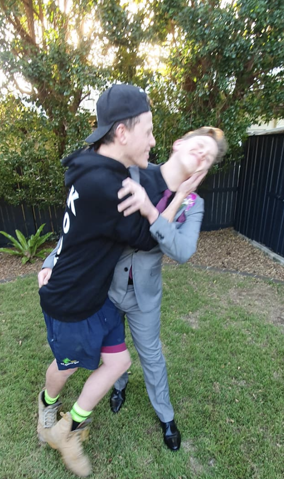 Lachy is seen joking around with his brother Mitchell before his school formal. Source: Suplied