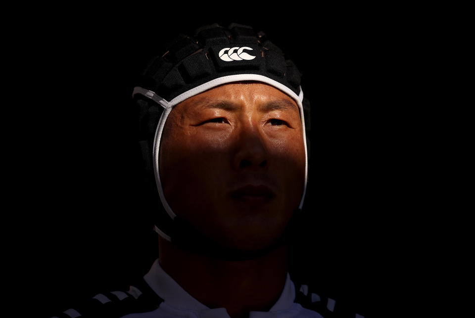 <p>Wanyong Park of South Korea waits to take to the field during the rugby sevens men's placing 9-12 match between Ireland and South Korea at Tokyo Stadium.</p>