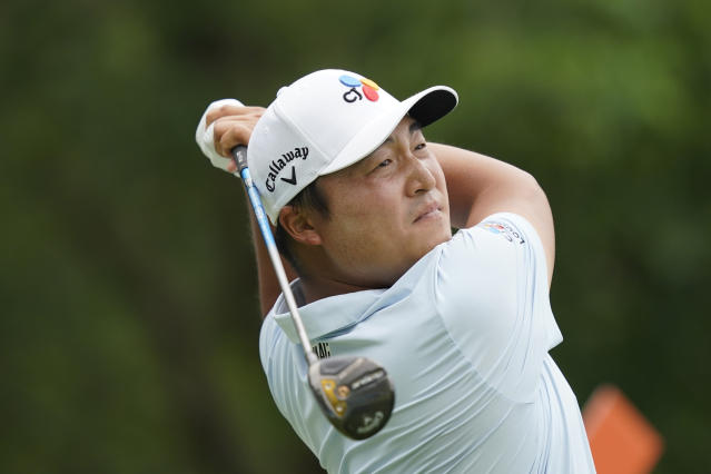 K.H. Lee, of South Korea, hits an approach shot on the sixth hole during the first round of the Byron Nelson golf tournament in McKinney, Texas, Thursday, May 11, 2023. (AP Photo/LM Otero)