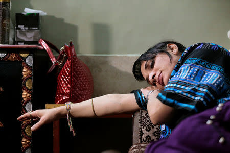 Shakeela, a member of the transgender community, rests at her home in Peshawar, Pakistan January 23, 2017. REUTERS/Caren Firouz