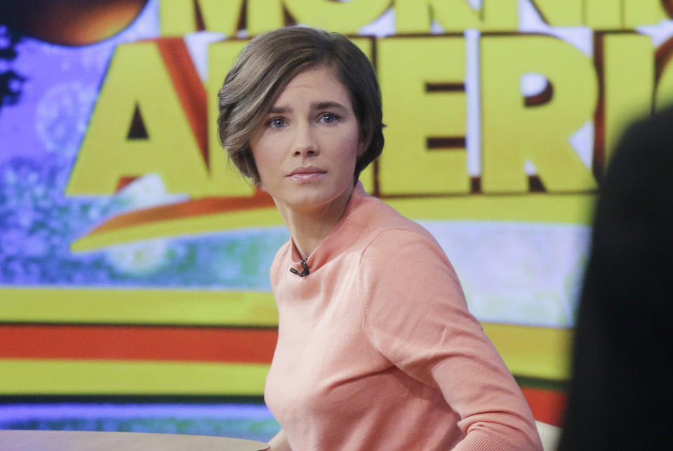 Amanda Knox prepares to leave the set following a television interview, Friday, Jan. 31, 2014 in New York. Knox said she will fight the reinstated guilty verdict against her and an ex-boyfriend in the 2007 slaying of a British roommate in Italy and vowed to "never go willingly" to face her fate in that country's judicial system . "I'm going to fight this to the very end," she said in an interview with Robin Roberts on ABC's "Good Morning America." (AP Photo/Mark Lennihan)