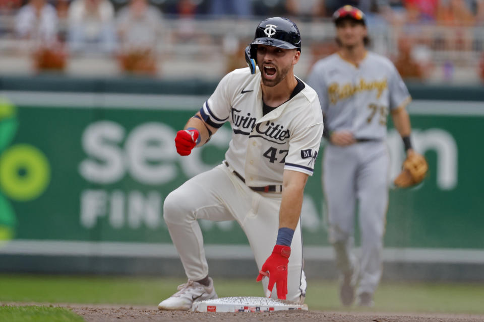 Minnesota Twins' Edouard Julien celebrates after his RBI double against the Pittsburgh Pirates in the sixth inning of a baseball game Sunday, Aug. 20, 2023, in Minneapolis. (AP Photo/Bruce Kluckhohn)