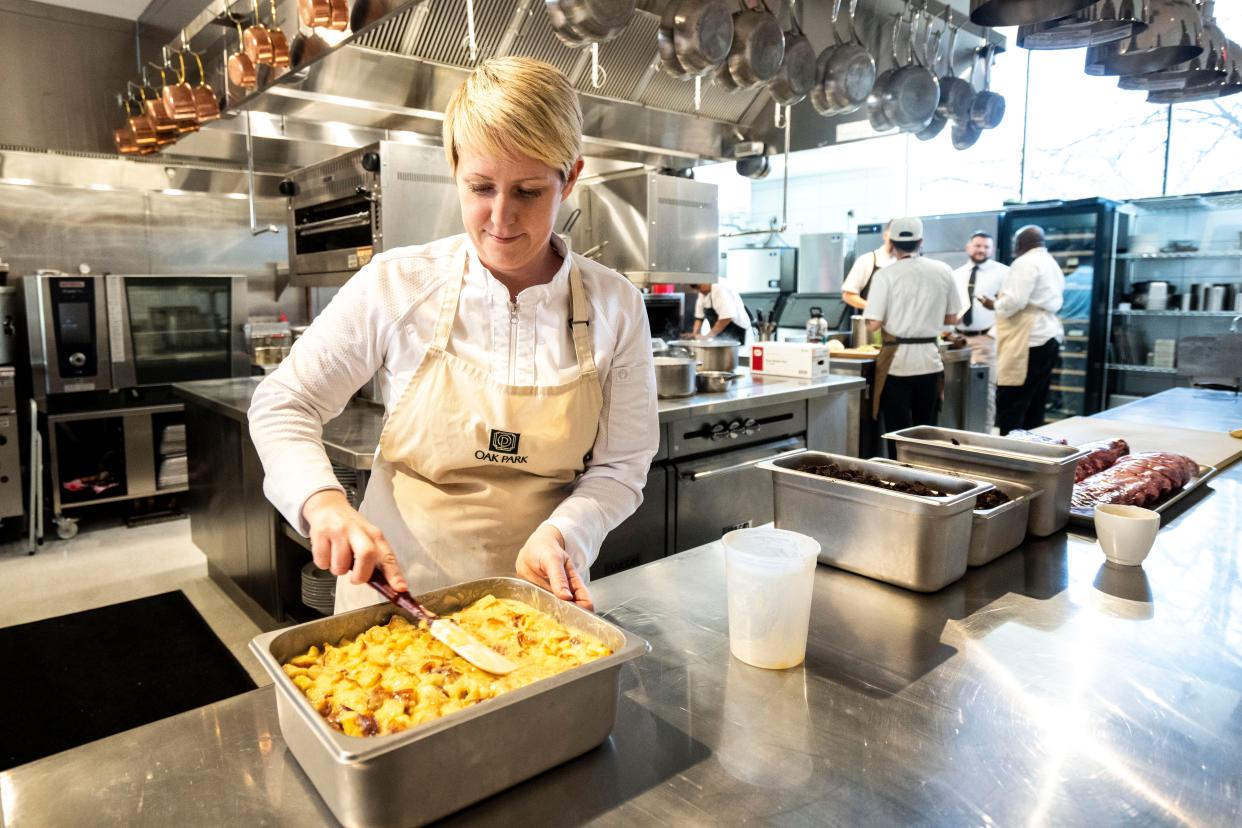 Executive pastry chef Jess Robertson prepares bread pudding at Oak Park.