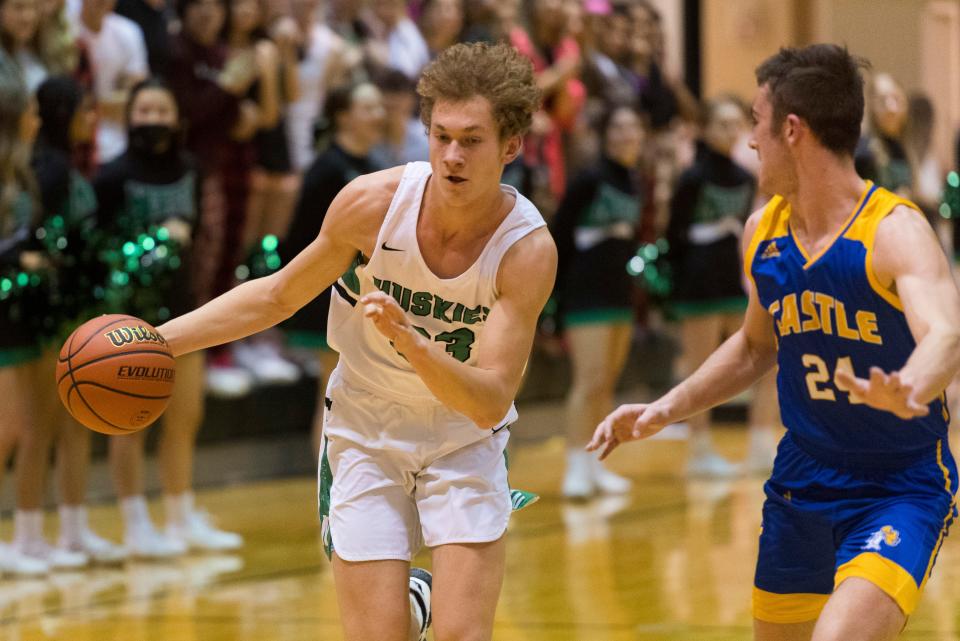 North’s Cameron Gehlhausen (33) drives to the net as the North Huskies play the Castle Knights during their IHSAA Class 4A sectional semifinal game at North High School Friday evening, March 4, 2022. 