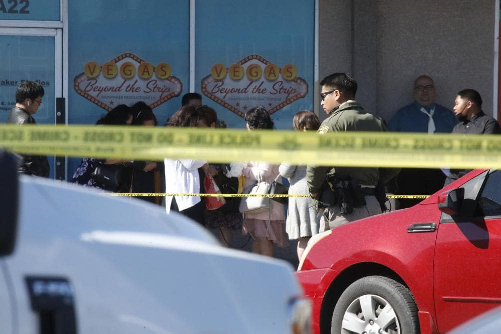 Las Vegas police investigate at Manny’s Glow Ultra Lounge & Restaurant, after a shooting, Saturday, Feb. 26, 2022, in Las Vegas. Multiple people were shot before dawn Saturday morning at a hookah parlor. (Chitose Suzuki/Las Vegas Review-Journal via AP)