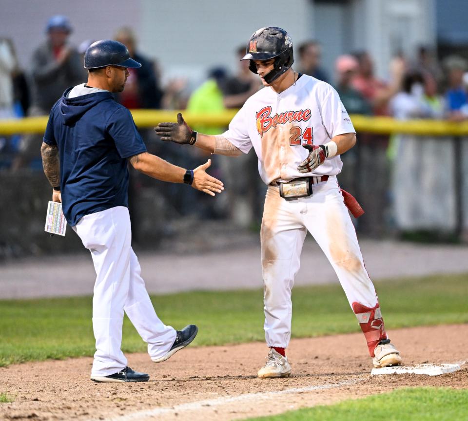 Matt Shaw of Bourne arrives at third with a triple against Brewster in the seventh bringing in a run during Wednesday's game in Bourne.