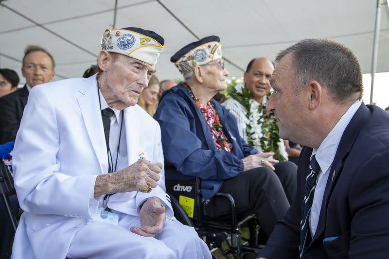 Hawaii Gov. Josh Green greets Pearl Harbor survivor, Jack Holder during a Pearl Harbor Remembrance ceremony on Dec. 7, 2022. (MCS1 Ernesto Bonilla/Navy)<cite class="op-small">Petty Officer 1st Class Ernesto Bonilla</cite>