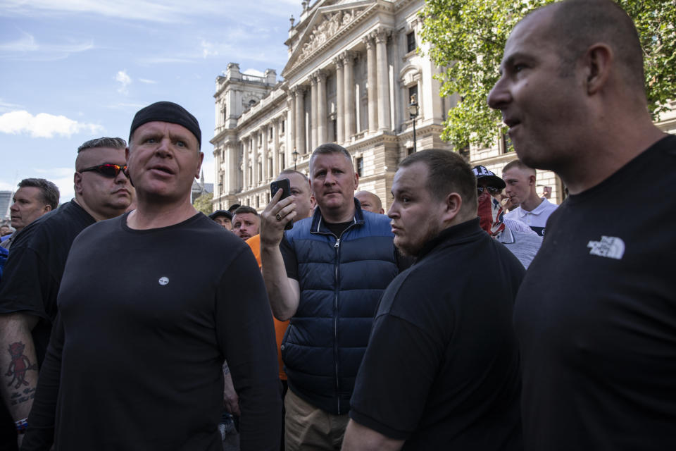 LONDON, ENGLAND - JUNE 13: Britain First leader Paul Golding (C) joins far-right activists gathering around London's statues on June 13, 2020 in London, England. Following a social media post by the far-right activist known as Tommy Robinson, members of far-right linked groups have gathered around statues in London. Several statues in the UK have been targeted by Black Lives Matter protesters for their links to racism and the slave trade. (Photo by Dan Kitwood/Getty Images)