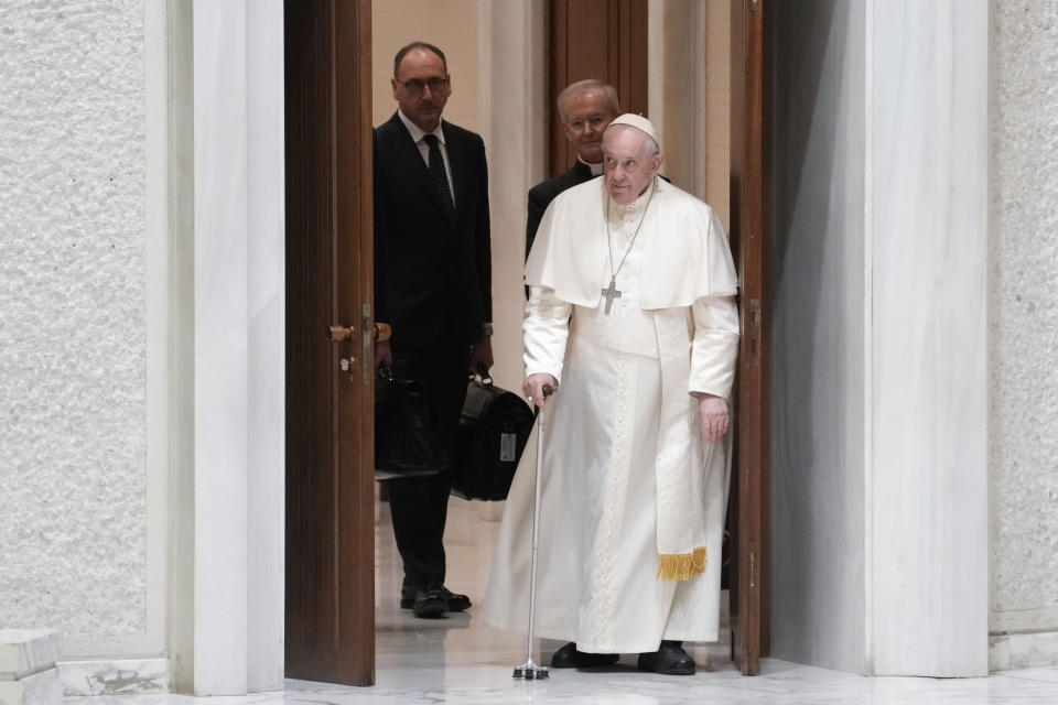 Pope Francis arrives for an audience with Vatican's employees in the Paul VI Hall, at the Vatican, Thursday, Dec. 22, 2022. (AP Photo/Andrew Medichini)