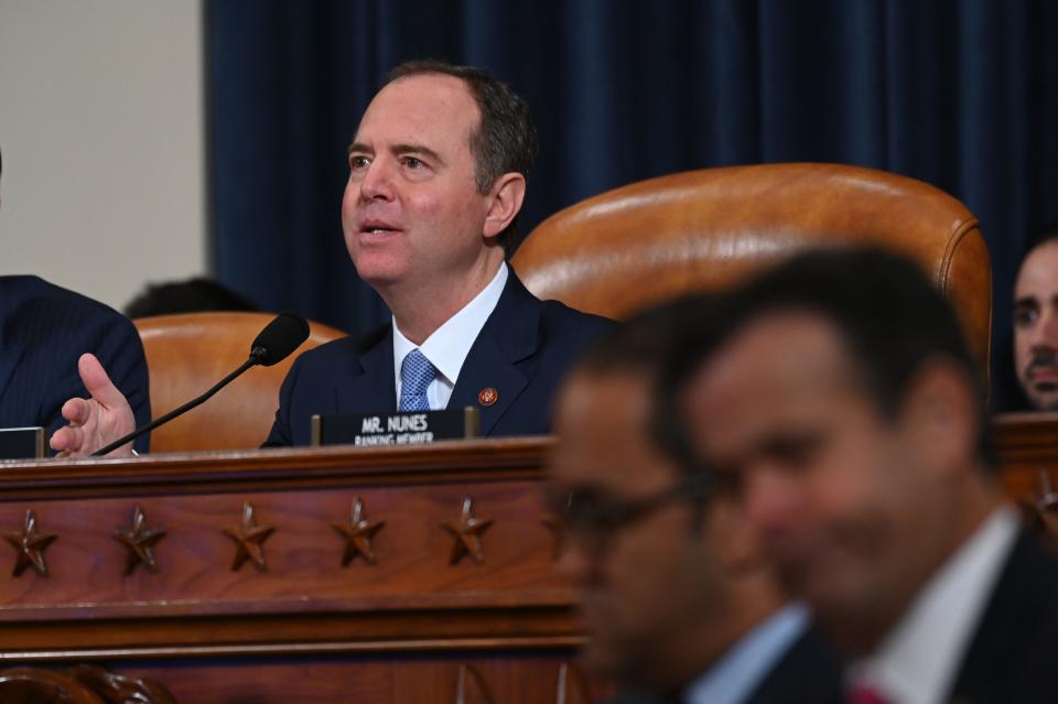 Chairman Adam Schiff asks National Security Council official Fiona Hill and State department official David Holmes questions as they testify before the Permanent Select Committee on Intelligence on Nov. 21, 2019 in a public hearing in the impeachment inquiry into allegations President Donald Trump pressured Ukraine to investigate his political rivals. 