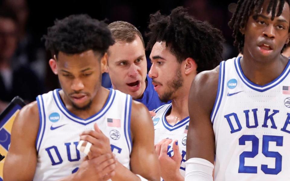 Duke head coach Jon Scheyer talks with Jared McCain (0) after a timeout during the first half of Duke’s game against JMU in the second round of the NCAA Tournament at the Barclays Center in Brooklyn, N.Y., Sunday, March 24, 2024. Ethan Hyman/ehyman@newsobserver.com