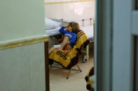 A boy sits in his room during his rehabilitation in a hospital south of Mosul, Iraq, April 11, 2017. Picture taken April 11, 2017. REUTERS/Marko Djurica