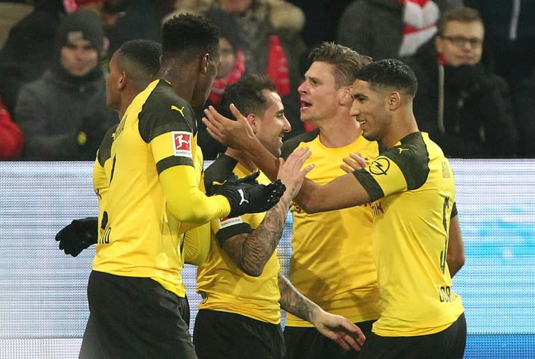 Borussia Dortmund mobbed Spanish forward Paco Alcacer after his late goal