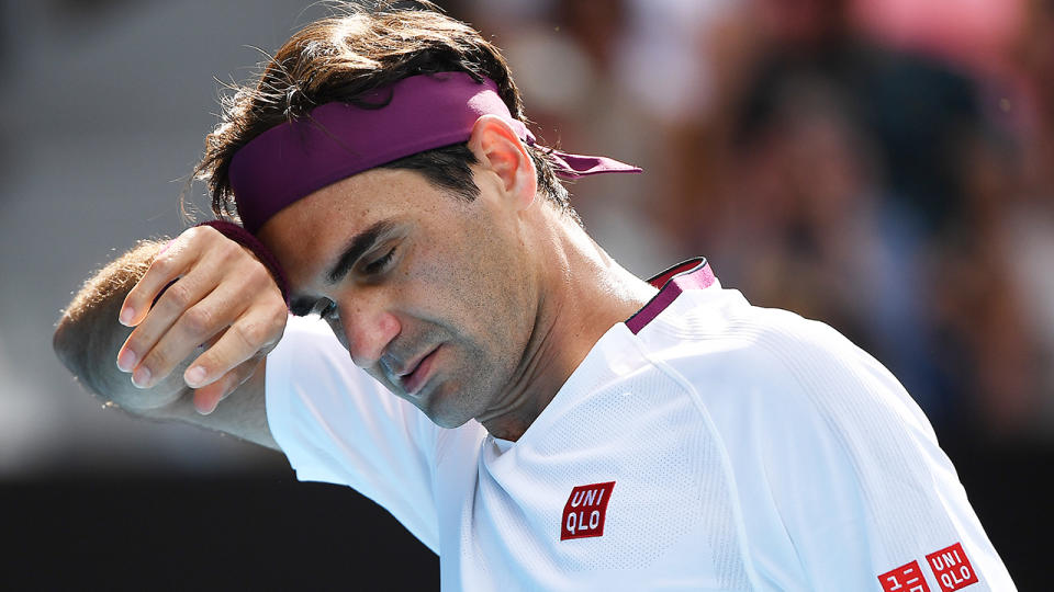 Roger Federer was forced to call for an injury timeout in the third set of his clash against Tennys Sandgren. (Photo by Hannah Peters/Getty Images)