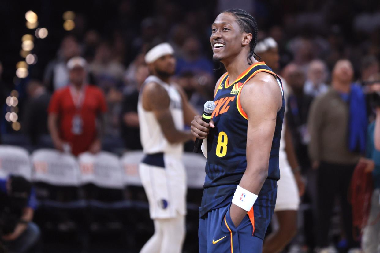 Oklahoma City Thunder forward Jalen Williams (8) speaks to the crowd before an NBA basketball game between the Oklahoma City Thunder and the Dallas Mavericks at Paycom in Oklahoma City, Sunday, April 14, 2024.