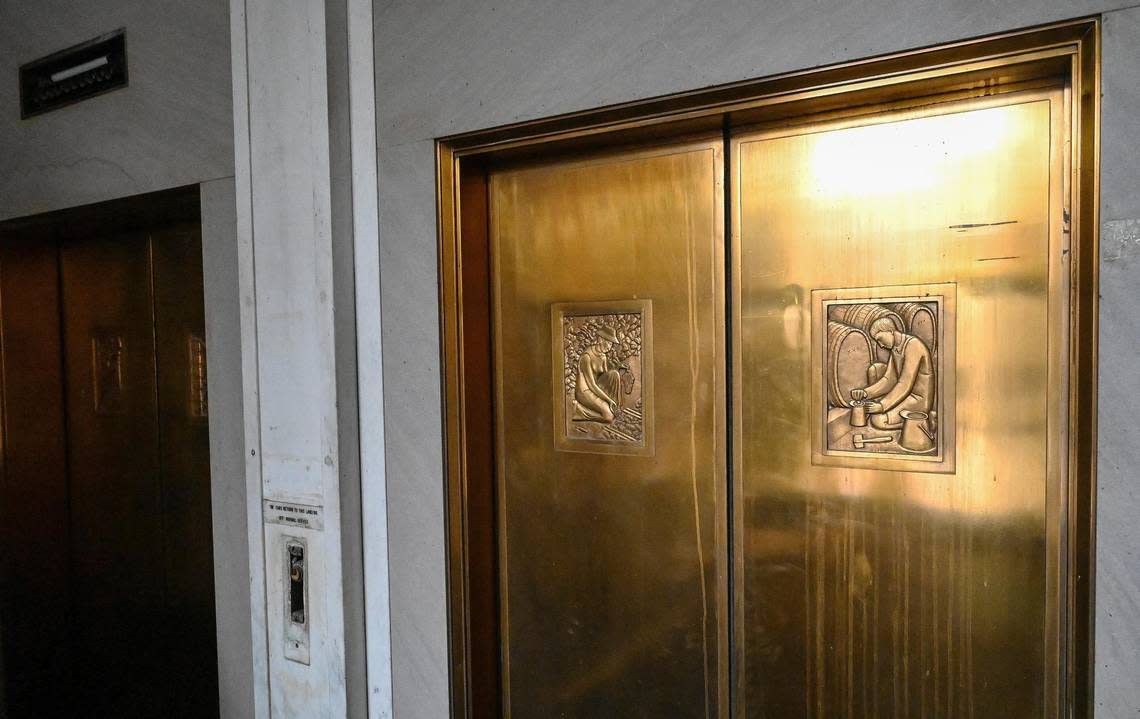 Grape harvesting and winemaking motifs still appear on the brass doors of the elevators on the ground floor of the Helm Building. Sevak Khatchadourian, who has successfully renovated the Pacific Southwest Building, is hoping to develop the Helm Building with new micro apartments.